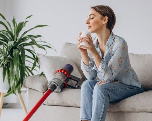 cleaning team vacuuming modern home